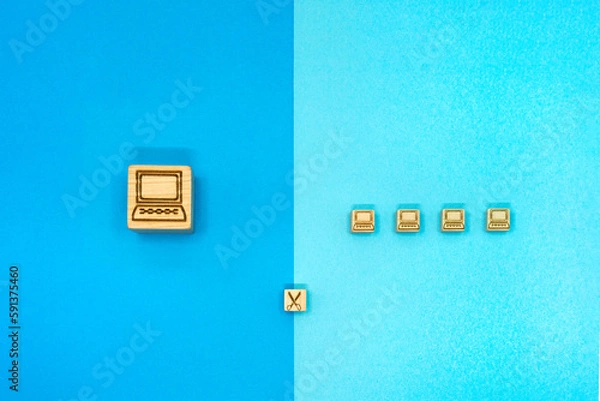 Fototapeta 大きなパソコンをハサミで分割して仕事を分担するイメージの青い背景