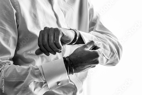 Obraz Goom preparing before the wedding. Black and white.