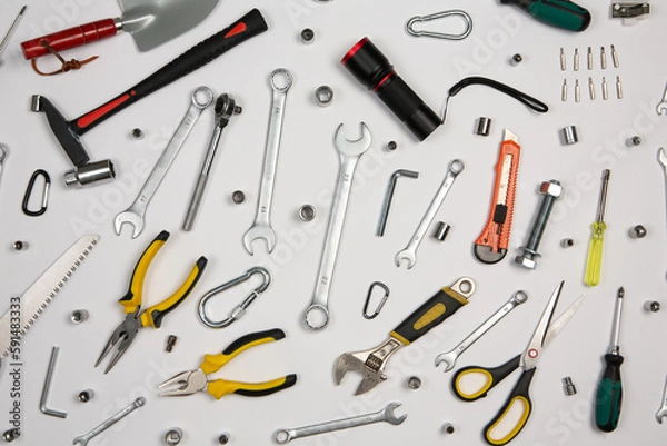 Fototapeta Set of tools for repair in a case on a white background. Assorted work or construction tools. Wrenches, Pliers, screwdriver. Top view