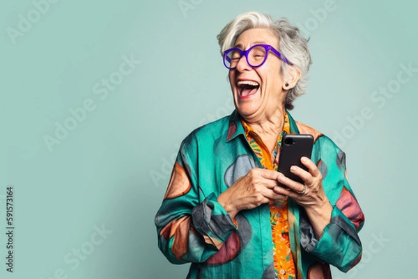 Fototapeta Funny old woman looking at a smartphone screen, laughing. Generative AI