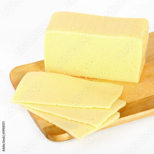 Obraz Cheese on cutting board