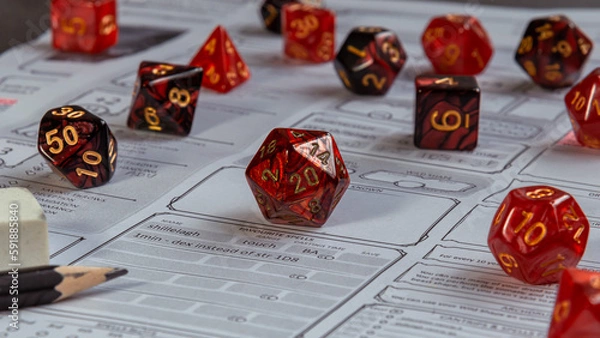 Fototapeta A set of Red RPG gaming dice on a character sheet