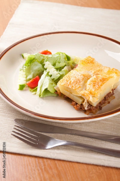Obraz Front ground beef meat with tomato and cream