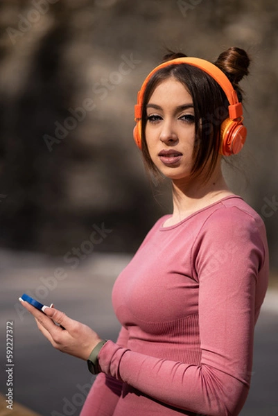 Obraz Fashionable Woman Embracing Technology