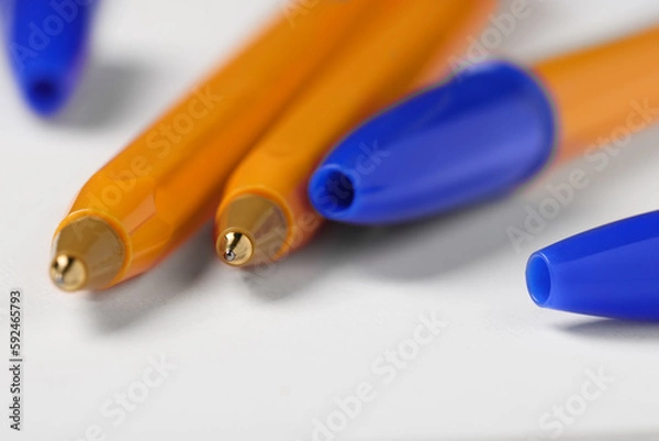 Obraz Ballpoint pens on white background, closeup view