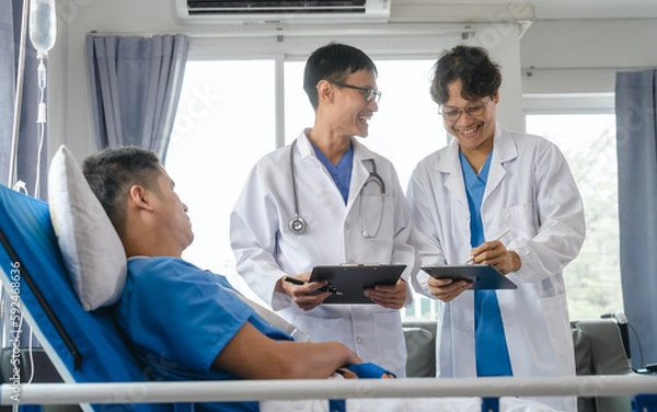 Fototapeta The medical team visits the car accident patients who are lying on the nursing bed and arm cast with wrapping nurse bandages splint to the arm.