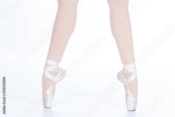 Fototapeta En Pointe CORRECT open showing calves front on teachers perspective Close up of young female ballet dancer showing various classic ballet feet positions pointe shoes