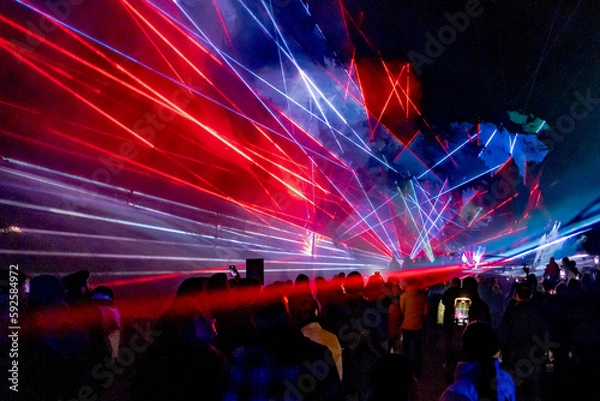 Obraz Crowd enyoing and recording lightshow with smartphones