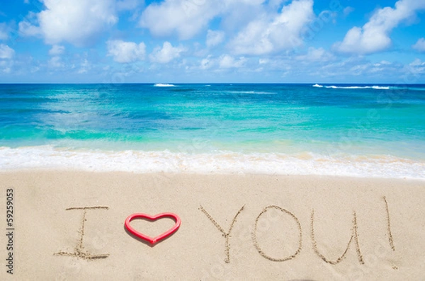 Fototapeta Sign "I love you" on the sandy beach