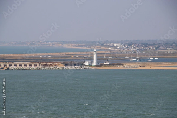 Fototapeta Looking towards Hurst Spit with the castle and lighthouse