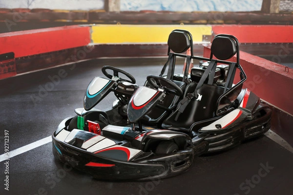 Fototapeta Empty two Seater go kart in pit lane