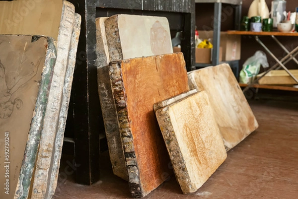 Fototapeta Storage of Lithographic limestones at the art workshop.