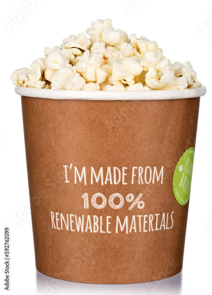Obraz Paper cup with a popcorn on white.