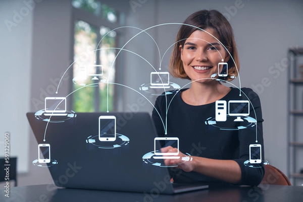 Fototapeta Pensive attractive beautiful businesswoman in formal wear working on laptop at office workplace in background. Concept of network connection information technology.