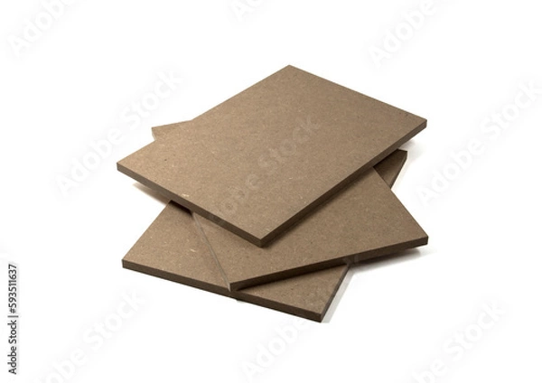 Fototapeta Three boards of raw mdf brown color stand on top of each other.