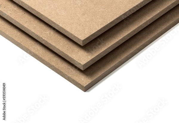 Fototapeta The MDF boards stand on top of each other, with a space between them.