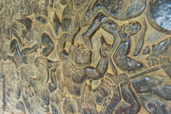 Fototapeta Bas-relief of on the walls of Angkor Wat