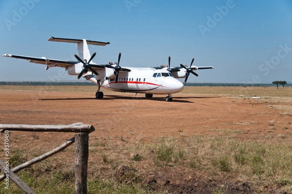 Obraz parked airplane in the national park masai mara in kenya