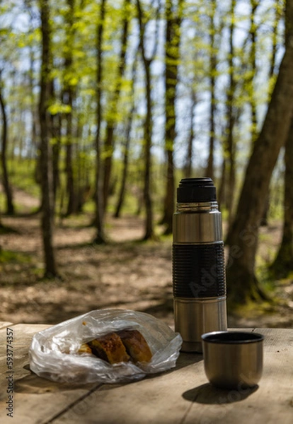Fototapeta cup of coffee in forest