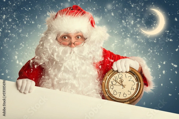 Fototapeta Santa Claus  with white blank banner holding a clock showing sev