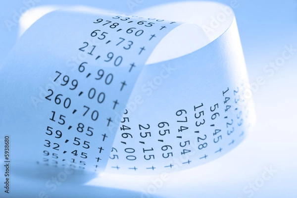 Fototapeta Macro of folded receit paper. Shallow DOF. Blue tone..