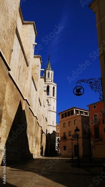 Fototapeta Spanish town with Cathedral at twilight
