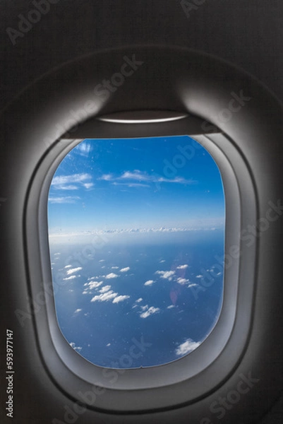 Fototapeta Horizon à travers un hublot d’avion 