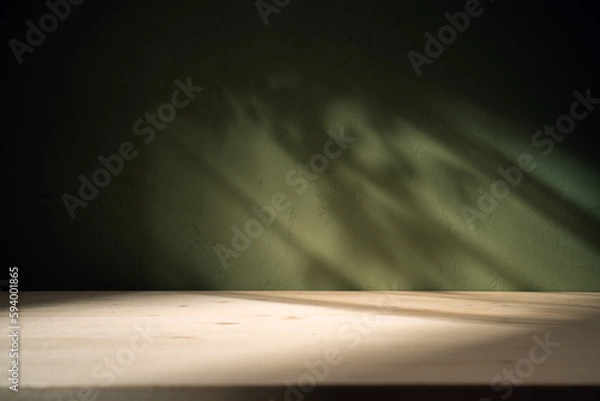 Fototapeta Empty table on khaki green texture wall background. Composition with leaves shadows on the wall and light reflections. Mock up for presentation, branding products, cosmetics food or jewelry.	

