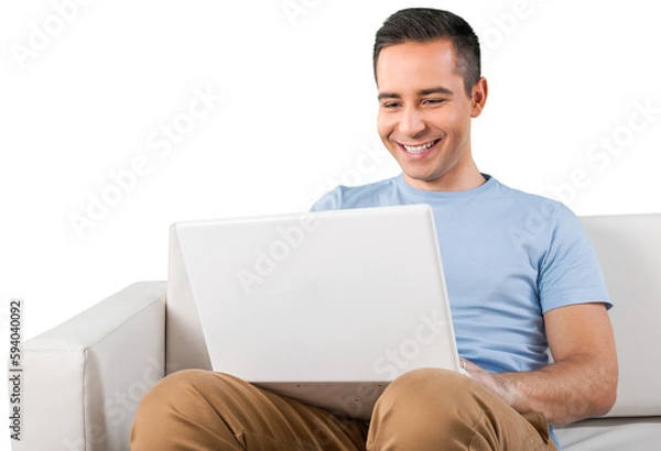 Obraz Portrait of young man using laptop isolated on white background