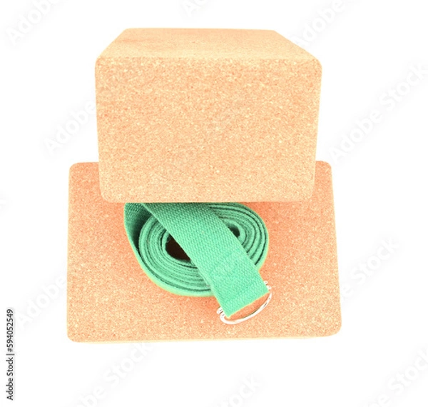 Fototapeta Two cork yoga blocks and green strap isolated on a white background