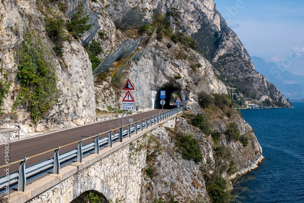 Fototapeta View of the road and the tunnel through the mountain, Lake Garda in Limone sul Garda