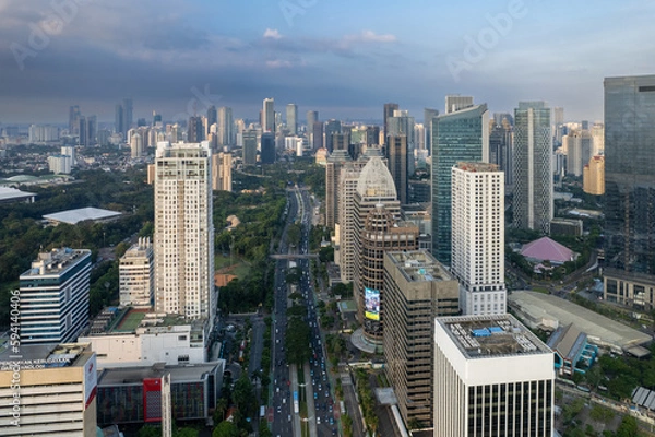 Fototapeta aerial shoot of Jakarta skyline during the golden hour. Jakarta is the capital city of indonesia that also one of the most populated city in the world.