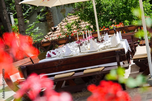 Fototapeta decorated table with dinner