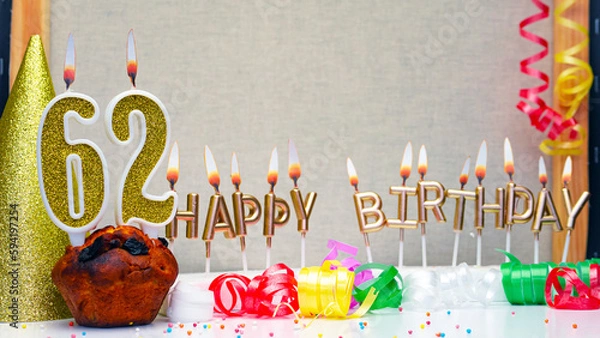 Obraz Happy birthday background with golden candles and decorations with candles burning number  62. Colorful festive card happy birthday with a number. Anniversary copy space