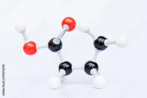 Obraz Butanoic acid is an oily colourless liquid with the chemical formula C4H8O2. It is a short chain saturated fatty acid found in the form of esters in animal fats and plant oils
