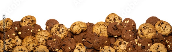 Fototapeta a heap of light and dark cookies  for banner, panorama or border