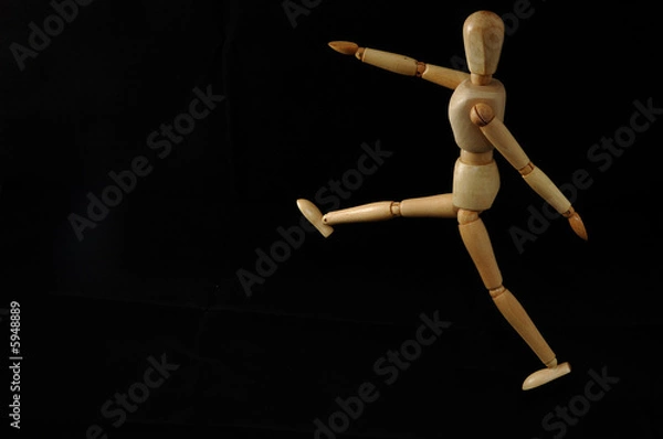 Fototapeta Uomo camminare statua di legno