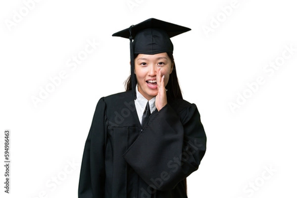 Obraz Young university graduate Asian woman over isolated background shouting with mouth wide open