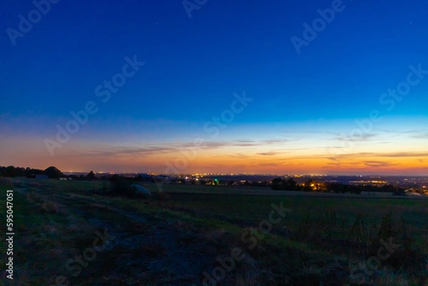 Fototapeta Panoramic view at the blue hour on a landscape