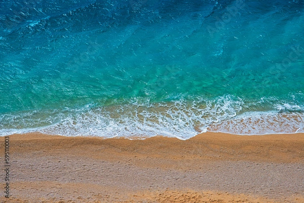 Obraz Clear turquose sea water at the empty beach, aerial view