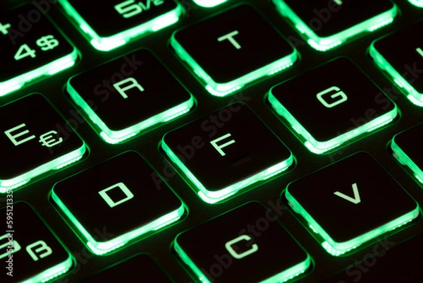 Fototapeta Close-up of laptop keyboard illumination, backlit keyboard