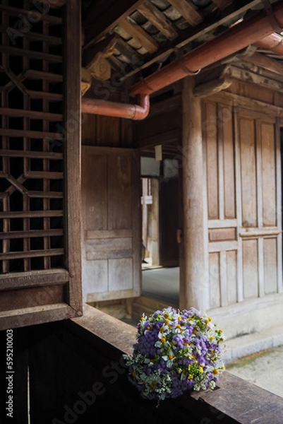 Obraz Flower bouquet on window frame in Sa Phin Hmong palace in Vietnam