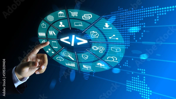 Fototapeta Software developers reach out to touch the programming code which is important in marketing analytics.