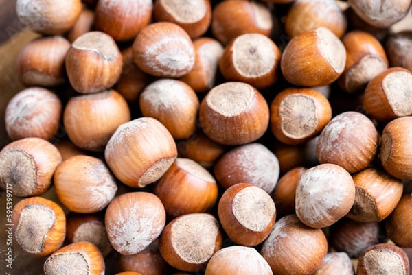 Fototapeta Pile of hazelnuts in a shell  close up