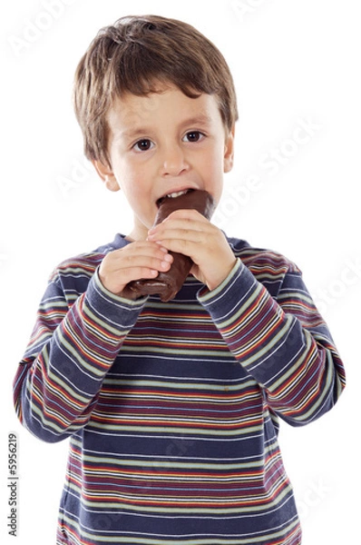 Obraz child eating chocolate a over white background