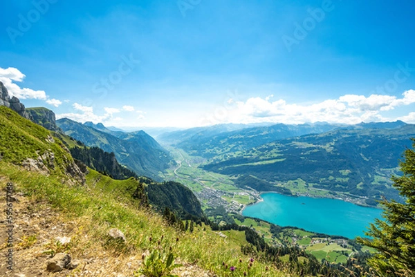 Obraz View of Walensee with the swiss alps in the background. Schnürliweg, Walensee, St. Gallen, Switzerland, Europe.
