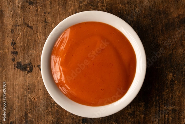 Fototapeta Buffalo Sauce in a Bowl