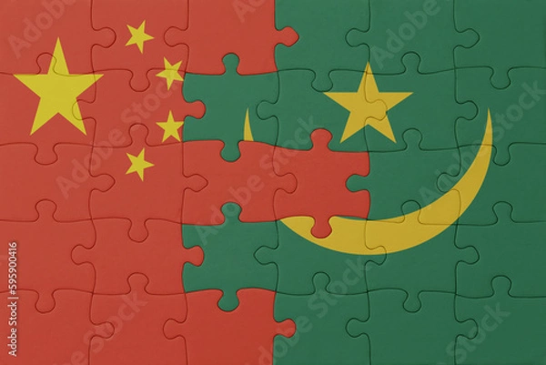 Fototapeta puzzle with the national flag of mauritania and china . macro.concept.