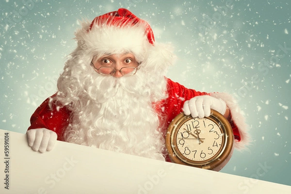 Fototapeta Santa Claus  with white blank banner holding a clock showing sev