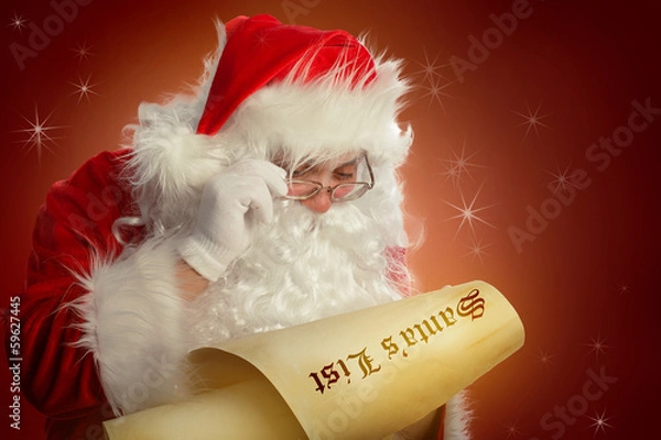 Obraz Santa Claus reading Santa's list